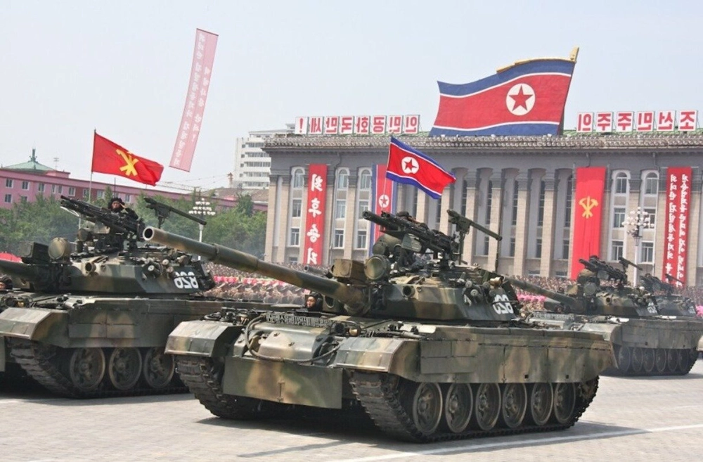 North Korea's Kim drives newly developed battle tank during launch
